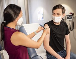 Experts warn vaccination alone won’t protect workers